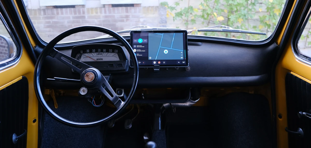 The tablet mounted in a classic Fiat 500